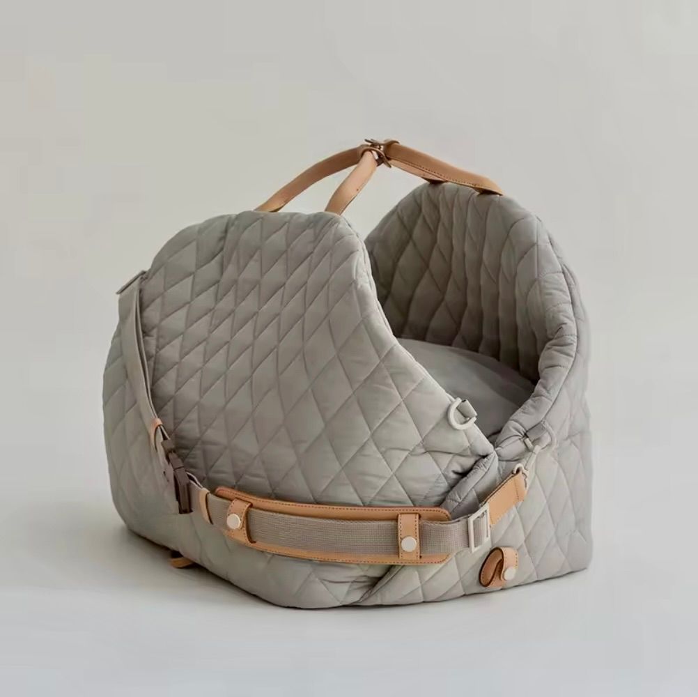 Exterior view of a 3-in-1 dog travel bed showing the removable strap