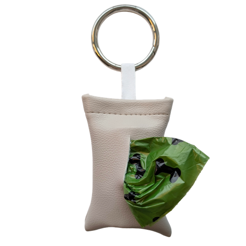 Gray color poop bag holder in vegan leather, handmade in Stockholm. The pouch features a metal ring and holds one roll of dog waste bags.