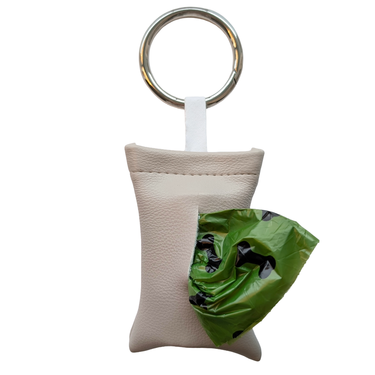 Gray color poop bag holder in vegan leather, handmade in Stockholm. The pouch features a metal ring and holds one roll of dog waste bags.